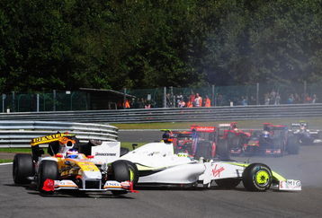 SPA FRANCORCHAMPS, BELGIUM - AUGUST 30:  Romain Grosjean (L) of France and Renault and Jenson Button (R) of Great Britain and Brawn GP collide at Les Combes corner on the first lap of the Belgian Grand Prix at the Circuit of Spa Francorchamps on August 30, 2009 in Spa Francorchamps, Belgium.  (Photo by Clive Mason/Getty Images)