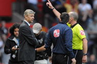 MANCHESTER, ENGLAND - AUGUST 29: Referee Mike Dean sends Arsenal Manager Arsene Wenger to the stands during the Barclays Premier League match between Manchester United and Arsenal at Old Trafford on August 29, 2009 in Manchester, England. (Photo by Laurence Griffiths/Getty Images)