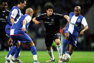 PORTO, PORTUGAL - FEBRUARY 21: Michael Ballack of Chelsea battles with Paulo Assuncao of FC Porto during the UEFA Champions League round of 16 first leg match between FC Porto and Chelsea at The Dragao Stadium on February 21, 2007 in Porto, Portugal.  (Photo by Laurence Griffiths/Getty Images)