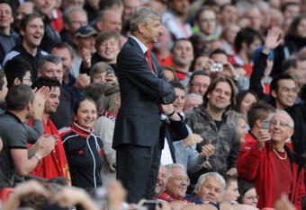 MANCHESTER, ENGLAND - AUGUST 29:  Arsenal Manager Arsene Wenger looks on after being sent to the stands during the Barclays Premier League match between Manchester United and Arsenal at Old Trafford on August 29, 2009 in Manchester, England.  (Photo by Laurence Griffiths/Getty Images)