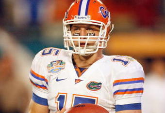 MIAMI - JANUARY 08:  Tim Tebow #15 of the Florida Gators looks to the sidelines against the Oklahoma Sooners during the FedEx BCS National Championship Game at Dolphin Stadium on January 8, 2009 in Miami, Florida.  (Photo by Eliot J. Schechter/Getty Images