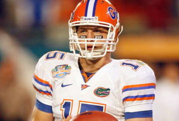 MIAMI - JANUARY 08:  Tim Tebow #15 of the Florida Gators looks to the sidelines against the Oklahoma Sooners during the FedEx BCS National Championship Game at Dolphin Stadium on January 8, 2009 in Miami, Florida.  (Photo by Eliot J. Schechter/Getty Images