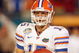MIAMI - JANUARY 08:  Tim Tebow #15 of the Florida Gators looks to the sidelines against the Oklahoma Sooners during the FedEx BCS National Championship Game at Dolphin Stadium on January 8, 2009 in Miami, Florida.  (Photo by Eliot J. Schechter/Getty Images