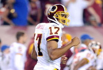 LANDOVER, MD - AUGUST 28:  Jason Campbell #17 of the Washington Redskins celebrates after a long completion during a preseason game against the New England Patriots at FedExField on August 28, 2009 in Landover, Maryland.  (Photo by Greg Fiume/Getty Images)