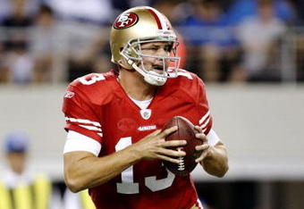 DALLAS - AUGUST 29:  Shaun Hill #13 of the San Francisco 49ers drops back to pass during the preseason game against the Dallas Cowboys at Cowboys Stadium on August 29, 2009 in Dallas, Texas.  (Photo by Ronald Martinez/Getty Images)