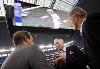 ARLINGTON, TX - AUGUST 21:  Dallas Cowboys team owner Jerry Jones (center) talks with two unidentified individuals prior to a preseason game at Dallas Cowboys Stadium on August 21, 2009 in Arlington, Texas. (Photo by Tom Pennington/Getty Images) 