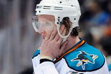 ANAHEIM, CA - APRIL 23:   Christian Ehrhoff #10 of the San Jose Sharks wipes his face during a break in game action against the Anaheim Ducks in the third period during Game Four of the Western Conference Quarterfinal Round of the 2009 Stanley Cup Playoffs at Honda Center on April 23, 2009 in Anaheim, California. The Ducks defeated the Sharks 4-0. (Photo by Kevork Djansezian/Getty Images)