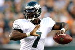 PHILADELPHIA, PA - AUGUST 27:  Michael Vick #7 of the Philadelphia Eagles throws his first pass during the preseason game against the Jacksonville Jaguars at Lincoln Financial Field on August 27, 2009 in Philadelphia, Pennsylvania.  (Photo by Jim McIsaac/Getty Images)