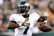 PHILADELPHIA, PA - AUGUST 27:  Michael Vick #7 of the Philadelphia Eagles throws his first pass during the preseason game against the Jacksonville Jaguars at Lincoln Financial Field on August 27, 2009 in Philadelphia, Pennsylvania.  (Photo by Jim McIsaac/Getty Images)