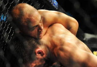 PHILADELPHIA - AUGUST 08:  (L-R) Lightweight champion BJ Penn battles Kenny Florian during their lightweight championship title bout at UFC 101: Declaration at the Wachovia Center on August 8, 2009 in Philadelphia, Pennsylvania.  (Photo by Jon Kopaloff/Getty Images)