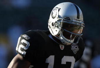 OAKLAND, CA - AUGUST 13:  Darrius Heyward-Bey #12 of the Oakland Raiders warms up against the Dallas Cowboys during a preseason game at Oakland-Alameda County Coliseum on August 13, 2009 in Oakland, California.  (Photo by Jed Jacobsohn/Getty Images)