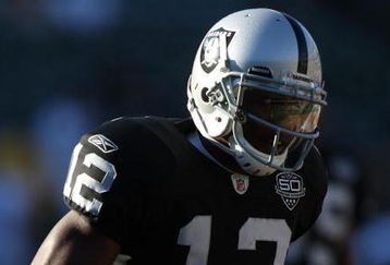 OAKLAND, CA - AUGUST 13:  Darrius Heyward-Bey #12 of the Oakland Raiders warms up against the Dallas Cowboys during a preseason game at Oakland-Alameda County Coliseum on August 13, 2009 in Oakland, California.  (Photo by Jed Jacobsohn/Getty Images)