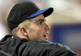 NEW YORK - AUGUST 20:  David Wright #5 of the New York Mets looks on as his team plays the Atlanta Braves on August 20, 2009 at Citi Field in the Flushing neighborhood of the Queens borough of New York City.  (Photo by Jim McIsaac/Getty Images)
