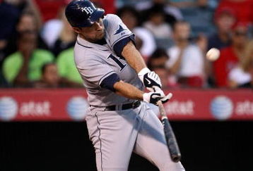 ANAHEIM, CA - AUGUST 11:  Pat Burrell #5 of the Tampa Bay Rays bats against the Los Angeles Angels of Anaheimon August 11, 2009 at Angel Stadium in Anaheim, California.  (Photo by Stephen Dunn/Getty Images)
