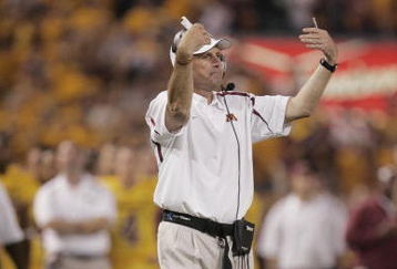 MINNEAPOLIS, MN - SEPTEMBER 29:  Head Coach Tim Brewster of the Minnesota Golden Gophers gestures to his players against the Ohio State Buckeyes during the game at the Metrodome on September 29, 2007 in Minneapolis, Minnesota.  Ohio State defeated Minnesota 30-7. (Photo by Jeff Gross/Getty Images)