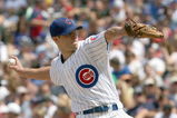 CHICAGO - JULY 26: Rich Harden #40 of the Chicago Cubs delivers the pitch during the game against the Cincinnati Reds on July 26, 2009 at Wrigley Field in Chicago, Illinois. (Photo by Jonathan Daniel/Getty Images) 