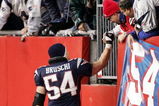 FOXBORO, MA - DECEMBER 17:  Tedy Bruschi #54 of the New England Patriots celebrates with fans after defeating  the Tampa Bay Buccaneers on December 17, 2005 at Gillette Stadium in Foxboro, Massachusetts. The Patriots defeated the Bucs 28-0.  (Photo by Al Bello/Getty Images)