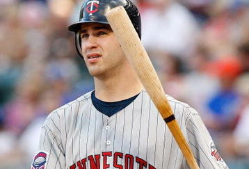 ARLINGTON, TX - JULY 17:  Catcher Joe Mauer #7 of the Minnesota Twins on July 17, 2009 at Rangers Ballpark in Arlington, Texas.  (Photo by Ronald Martinez/Getty Images)