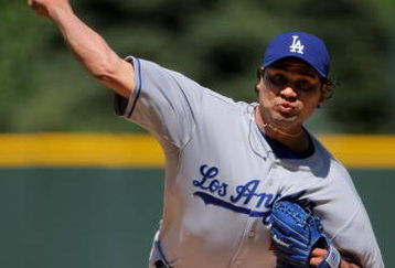 DENVER - AUGUST 27:  Starting pitcher Vicente Padilla #44 of the Los Angeles Dodgers delivers against the Colorado Rockies at Coors Field on August 27, 2009 in Denver, Colorado. The Dodgers defeated the Rockies 3-2.  (Photo by Doug Pensinger/Getty Images)
