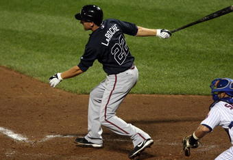 NEW YORK - AUGUST 19:  Adam LaRoche #22 of the Atlanta Braves bats against the New York Mets on August 19, 2009 at Citi Field in the Flushing neighborhood of the Queens borough of New York City.  (Photo by Jim McIsaac/Getty Images)