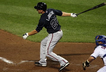 NEW YORK - AUGUST 19:  Adam LaRoche #22 of the Atlanta Braves bats against the New York Mets on August 19, 2009 at Citi Field in the Flushing neighborhood of the Queens borough of New York City.  (Photo by Jim McIsaac/Getty Images)