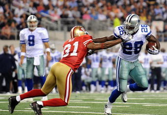 ARLINGTON, TX - AUGUST 29:  Runnng back Felix Jones #28 of the Dallas Cowboys runs the ball against Dre' Bly #31 of the San Francisco 49ers at Cowboys Stadium on August 29, 2009 in Arlington, Texas.  (Photo by Ronald Martinez/Getty Images)