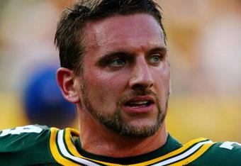 GREEN BAY, WI - AUGUST 15:  Linebacker Aaron Kampman #74 of the Green Bay Packers looks on before taking on the Cleveland Browns during the preseason game at Lambeau Field on August 15, 2009 in Green Bay, Wisconsin. (Photo by Jonathan Daniel/Getty Images)