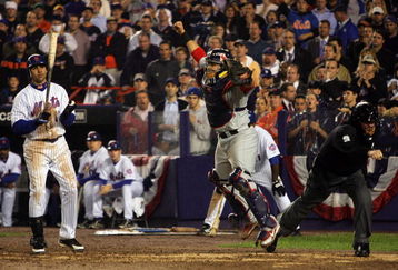 NEW YORK - OCTOBER 19:  Catcher Yadier Molina #4 of the St. Louis Cardinals reacts after Carlos Beltran #15 of the New York Mets stikes out to end game seven of the NLCS at Shea Stadium on October 19, 2006 in the Flushing neighborhood of the Queens borough of New York City. The Cardinals won 3 to 1.  (Photo by Al Bello/Getty Images)