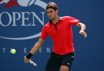 NEW YORK - AUGUST 31:  Roger Federer of Switzerland returns a shot against Devin Britton of the United States during day one of the 2009 U.S. Open at the USTA Billie Jean King National Tennis Center on August 31, 2009 in Flushing neighborhood of the Queens borough of New York City.  (Photo by Matthew Stockman/Getty Images)