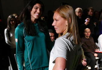 NEW YORK - FEBRUARY 24:  Hope Solo (L) and Lori Chalupny model the Saint Louis Athletica team uniforms during a fashion show to unveil the new uniforms for the Women's Professional Soccer League February 24, 2009 in New York City.  (Photo by Chris McGrath/Getty Images)