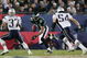 JACKSONVILLE, FLORIDA - FEBRUARY 06:  Wide receiver Todd Pinkston #87 of the Philadelphia Eagles looks for an opening around Rodney Harrison #37 and Tedy Bruschi #54 of the New England Patriots after catching a 17-yard pass against the New England Patriots in the second quarter during Super Bowl XXXIX at Alltel Stadium on February 6, 2005 in Jacksonville, Florida.  (Photo by Jed Jacobsohn/Getty Images)