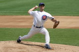CHICAGO - JULY 26: Rich Harden #40 of the Chicago Cubs delivers the pitch during the game against the Cincinnati Reds on July 26, 2009 at Wrigley Field in Chicago, Illinois. (Photo by Jonathan Daniel/Getty Images) 
