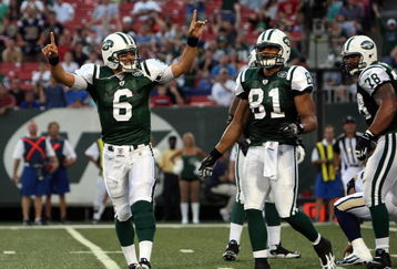 EAST RUTHERFORD, NJ - AUGUST 14:  Mark Sanchez #6 of the New York Jets celebrates his first touchdown during the preseason game against the St. Louis Rams at Giants Stadium on August 14, 2009  in East Rutherford, New Jersey.  (Photo by Nick Laham/Getty Images)