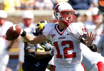ANN ARBOR, MI - SEPTEMBER 06: Daniel Raudabaugh #12 of the Miami of Ohio Red Hawks gets ready to throw a pass while playing the Michigan Wolverines on September 6, 2008 at Michigan Stadium in Ann Arbor, Michigan. Michigan won the game 16-6.  (Photo by Gregory Shamus/Getty Images)