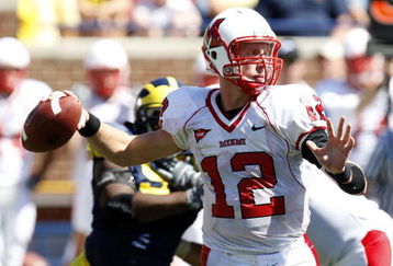 ANN ARBOR, MI - SEPTEMBER 06: Daniel Raudabaugh #12 of the Miami of Ohio Red Hawks gets ready to throw a pass while playing the Michigan Wolverines on September 6, 2008 at Michigan Stadium in Ann Arbor, Michigan. Michigan won the game 16-6.  (Photo by Gregory Shamus/Getty Images)