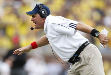 ANN ARBOR, MI - SEPTEMBER 27: Head coach Rich Rodriguez of the Michigan Wolverines reacts after a defensive stop while playing the Wisconsin Badgers on September 27, 2008 at Michigan Stadium in Ann Arbor, Michigan. (Photo by Gregory Shamus/Getty Images)