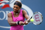 NEW YORK - AUGUST 31:  Serena Williams of the United States returns a shot against Alexa Glatch of the United States during day one of the 2009 U.S. Open at the USTA Billie Jean King National Tennis Center on August 31, 2009 in Flushing neighborhood of the Queens borough of New York City.  (Photo by Al Bello/Getty Images)