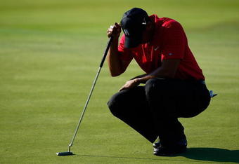 JERSEY CITY, NJ - AUGUST 30:  Tiger Woods waits for his birdie putt on the 17th green during the final round of The Barclays on August 30, 2009 at Liberty National in Jersey City, New Jersey.  (Photo by Kevin C. Cox/Getty Images)