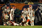 MIAMI - JANUARY 08:  The Florida Gators defense celebrates after the stopped Chris Brown #29 of the Oklahoma Sooners on a fourth and goal play in the second quarter during the FedEx BCS National Championship game at Dolphin Stadium on January 8, 2009 in Miami, Florida.  (Photo by Doug Benc/Getty Images)