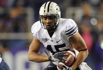 FORT WORTH, TX - OCTOBER 16:  Running back Harvey Unga #45 of the BYU Cougars runs against the TCU Horned Frogs at Amon G. Carter Stadium on October 16, 2008 in Fort Worth, Texas.  (Photo by Ronald Martinez/Getty Images)
