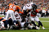 DENVER - AUGUST 30:  Running back Matt Forte #22 of the Chicago Bears goes up the middle for a one yard touchdown against Brian Dawkins #20 of the Denver Broncos during the second quarter at INVESCO Field at Mile High on August 30, 2009 in Denver, Colorado.  (Photo by Doug Pensinger/Getty Images)