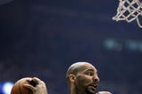 SALT LAKE CITY - APRIL 25:  Carlos Boozer #5 of the Utah Jazz comes down with a rebound in Game Four of the Western Conference Quarterfinals against the Los Angeles Lakers during the 2009 NBA Playoffs at Energy Solutions Arena on April 25, 2009 in Salt Lake City, Utah.  The Lakers won 108-94.  NOTE TO USER: User expressly acknowledges and agrees that, by downloading and/or using this Photograph, user is consenting to the terms and conditions of the Getty Images License Agreement.  (Photo by Otto Greule Jr/Getty Images)  