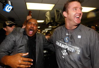 CHICAGO - SEPTEMBER 30:  (L-R)  General manager Kenny Williams and Jim Thome #25 of the Chicago White Sox celebrate in the locker room against the Minnesota Twins during the American League Central Division Tiebreaker game at U.S. Cellular Field on September 30, 2008 in Chicago, Illinois.  (Photo by Jamie Squire/Getty Images)