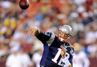 LANDOVER, MD - AUGUST 28:  Tom Brady #12 of the New England Patriots throws a pass in a preseason game against the Washington Redskins at FedExField on August 28, 2009 in Landover, Maryland.  (Photo by Greg Fiume/Getty Images)