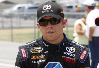 MEMPHIS, TN - JUNE 27: Brian Scott, driver of the #16 Albertson's Toyota sits on the pit wall during qualifying for the MemphisTravel.com 200 Camping World Truck Series race at the Memphis Motorsports Park on June 27, 2009 in Memphis, Tennessee.   (Photo by John Sommers II/Getty Images)