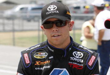MEMPHIS, TN - JUNE 27: Brian Scott, driver of the #16 Albertson's Toyota sits on the pit wall during qualifying for the MemphisTravel.com 200 Camping World Truck Series race at the Memphis Motorsports Park on June 27, 2009 in Memphis, Tennessee.   (Photo by John Sommers II/Getty Images)