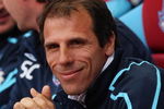 LONDON, ENGLAND - APRIL 25: Manager of West Ham United Gianfranco Zola smiles during the Barclays Premier League match between West Ham United and Chelsea at Upton Park on April 25, 2009 in London, England.  (Photo by Hamish Blair/Getty Images)