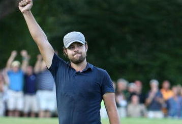 GREENSBORO, NC - AUGUST 23:  Ryan Moore celebrates after making a putt to win the Wyndham Championship in a sudden death playoff against Kevin Stadler and Jason Bohn at Sedgefield Country Club on August 23, 2009 in Greensboro, North Carolina  (Photo by Streeter Lecka/Getty Images)