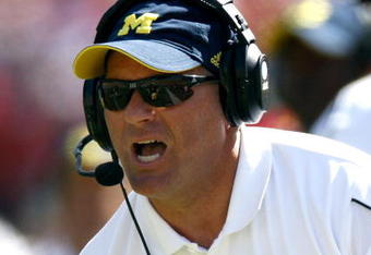 ANN ARBOR, MI - AUGUST 30:  Head coach Rich Rodriguez of the Michigan Wolverines yells from the sideline duirng the first quarter while playing the Utah Utes on August 30, 2008 at Michigan Stadium in Ann Arbor, Michigan.  (Photo by Gregory Shamus/Getty Images)