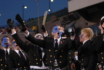 PHILADELPHIA - DECEMBER 3:  In this handout provided by the U.S. Navy, a Midshipmen from the U.S. Naval Academy celebrates during the 106th Army vs.Navy football game on December 3, 2005 held for the third consecutive year at Lincoln Financial Field in Philadelphia, Pennsylvania. The Midshipmen have won the past three Army-Navy battles to even the all-time series at 49-49-7. Navy has accepted an invitation to play in the Poinsettia Bowl in San Diego on December 22.  (Photo by James G. Pinsky/U.S. Navy via Getty Images)